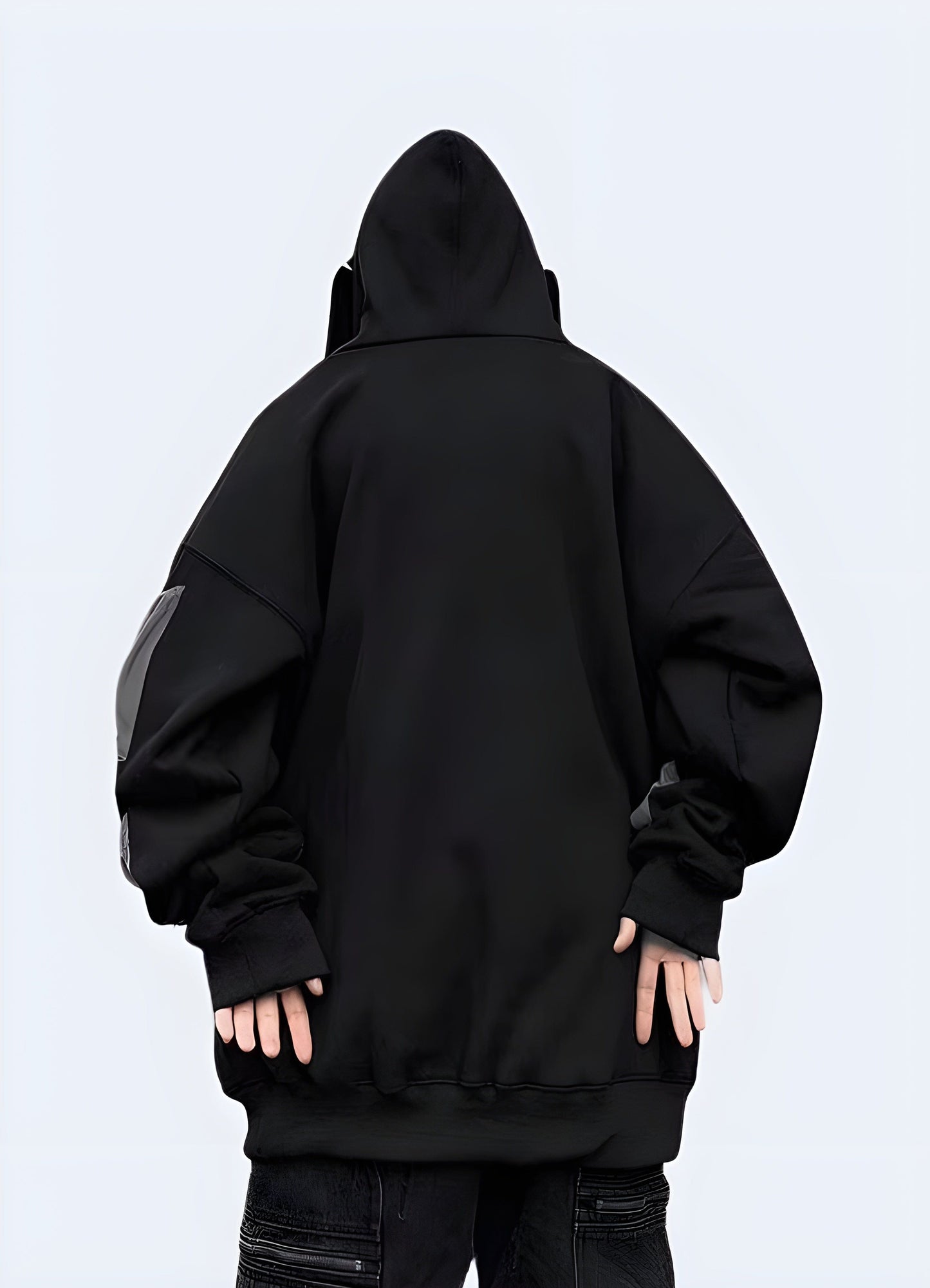 Back view of a sleek black hoodie, showcasing its versatility for streetwear outfits in the UK.