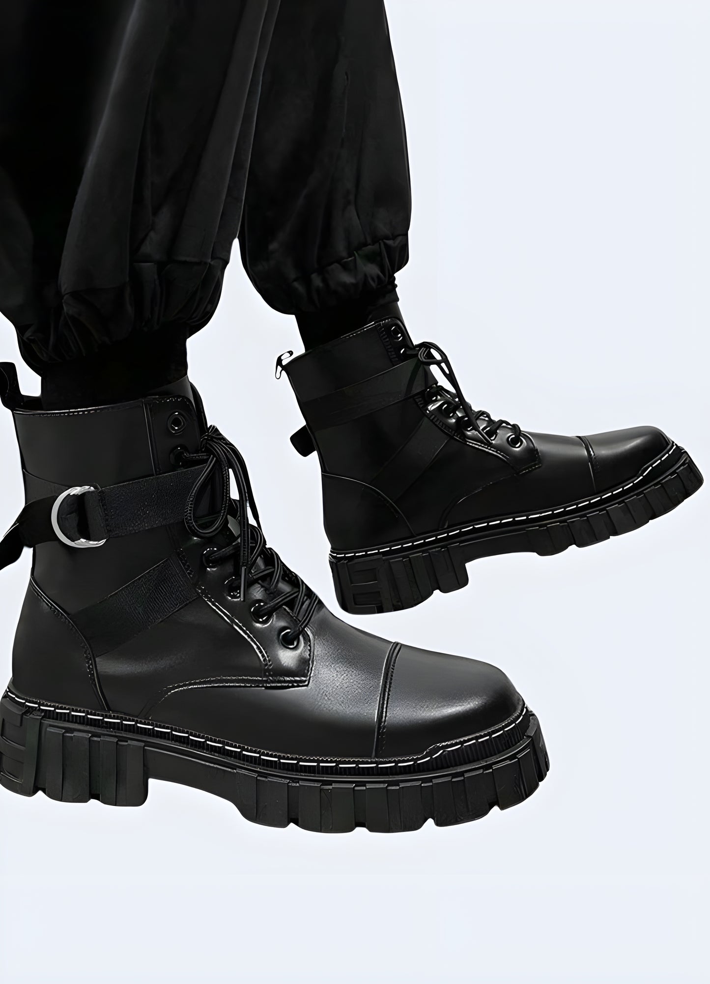 Side view of a man wearing goth techwear boots, demonstrating the comfortable fit, edgy appearance, and ability to elevate any dark or tech-inspired outfit.