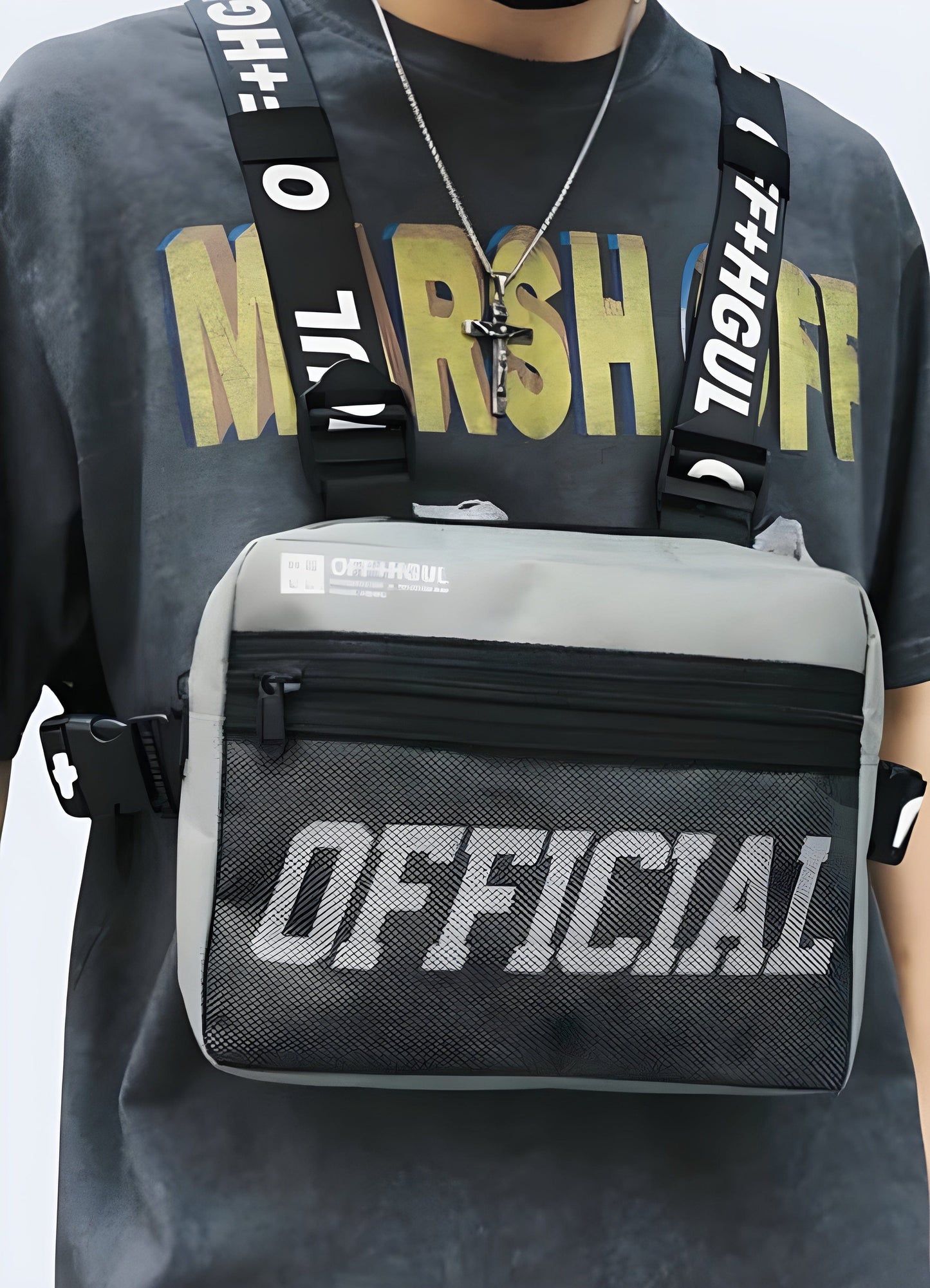 Men displaying a grey fashion chest bag, highlighting its sleek design for UK fashion scenes.