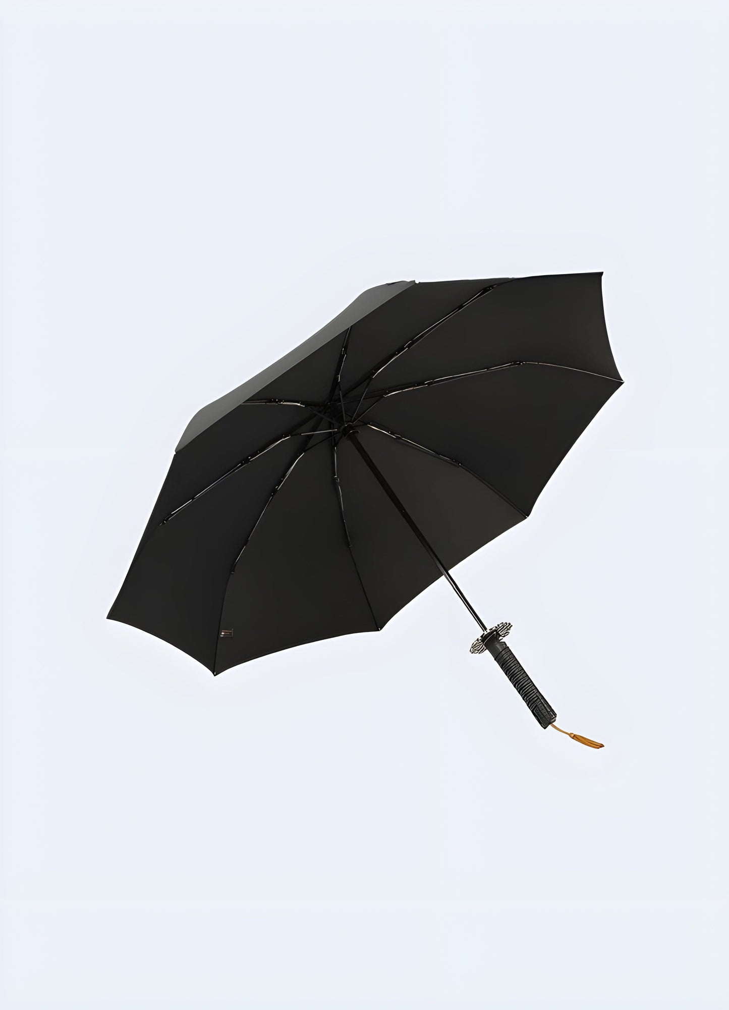 Inside view of a traditional UK-style short umbrella knife, showing the blade and internal mechanism.