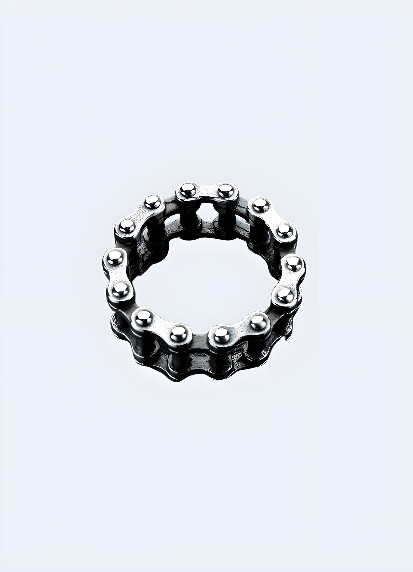 Silver mechanical chain ring front side view in the UK, presenting a blend of sophistication and mechanical artistry.