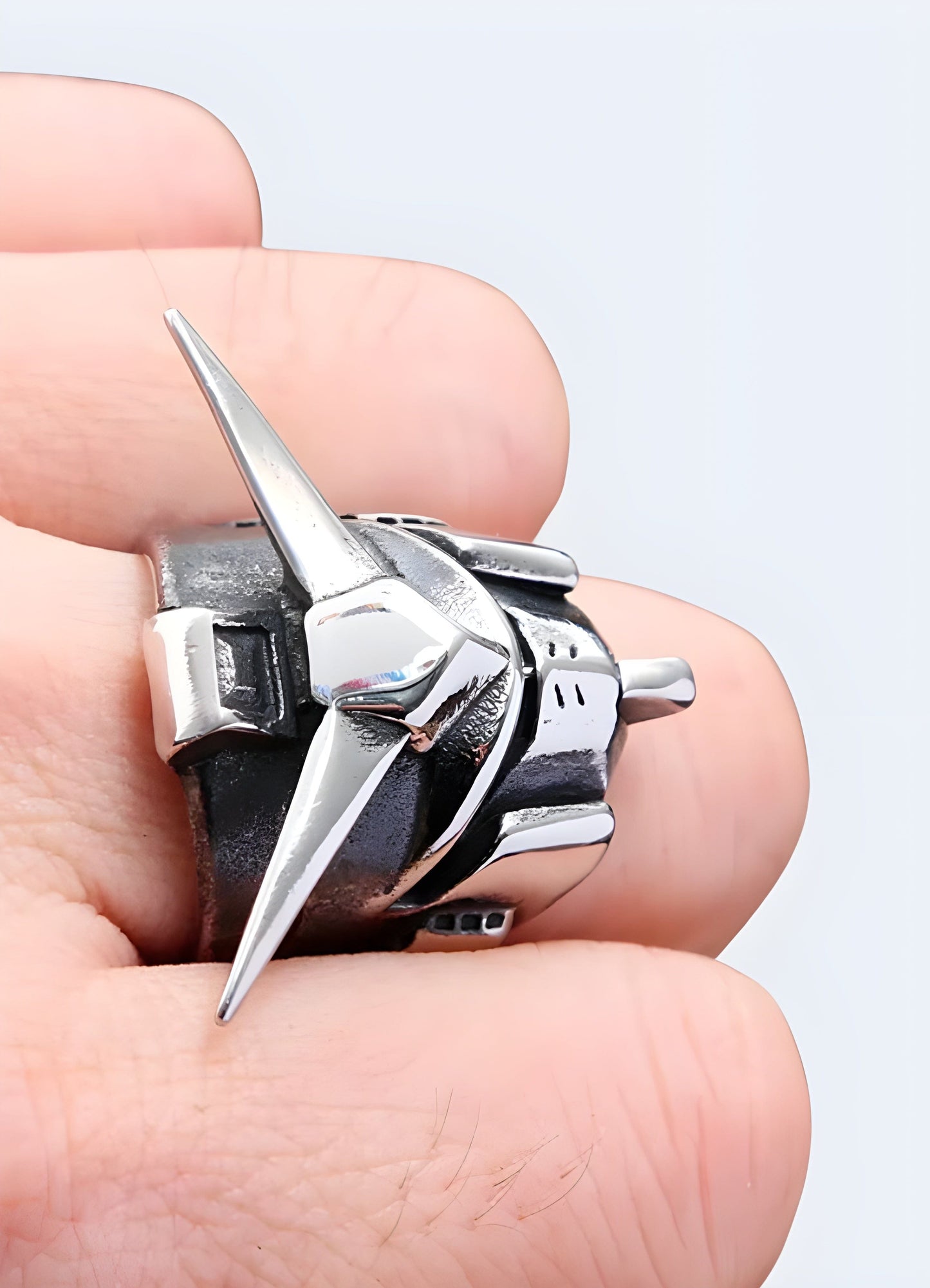 The gundam ring stands out as an emblem of where techwear converges with the evocative narrative of cyberpunk UK.