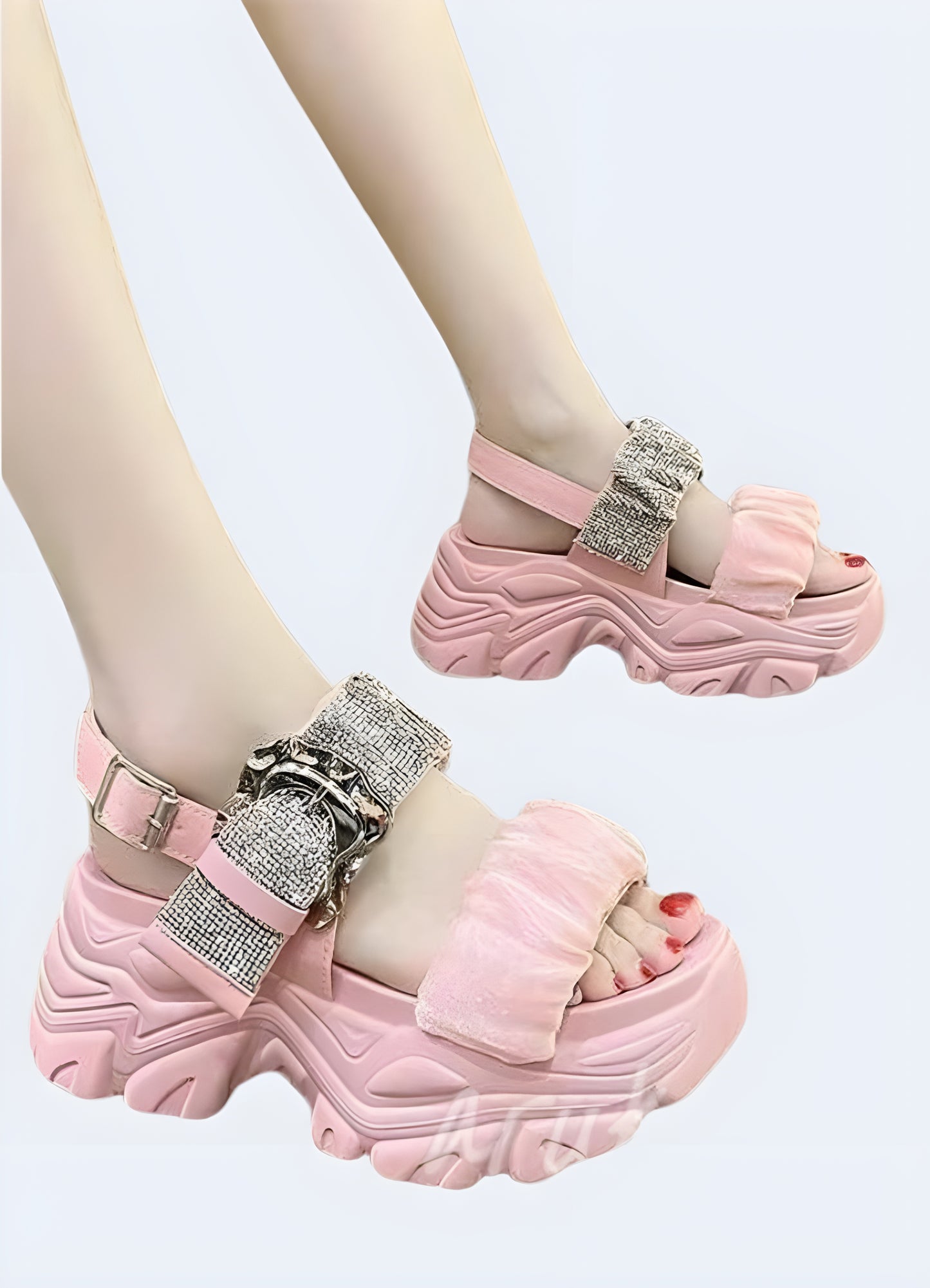 Full view of a woman wearing white chunky sandals, demonstrating how to style the on-trend footwear for a chic summer look in the UK.