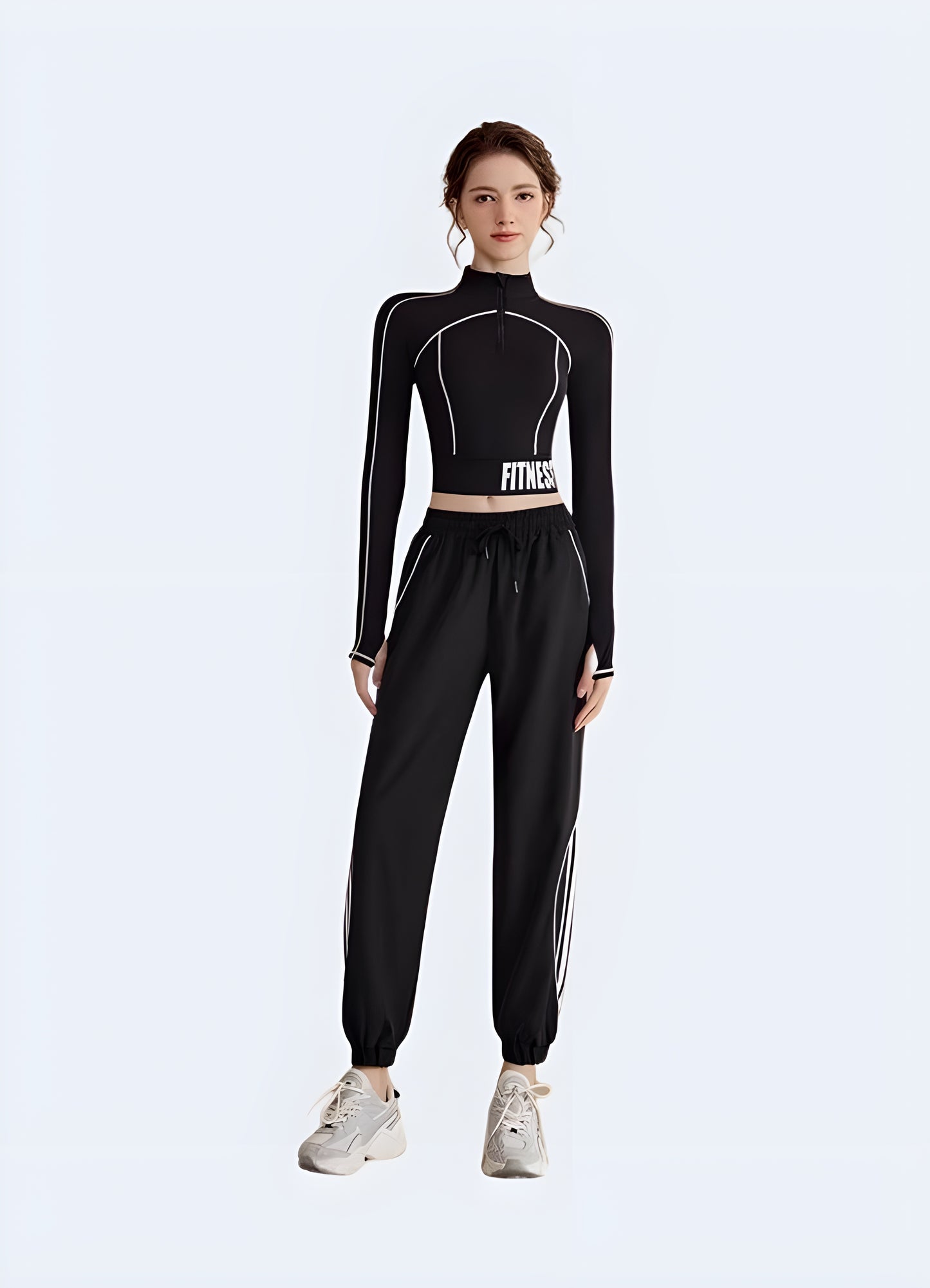Women’s wearing techwear crop top UK – Futuristic black crop top with tactical details, worn by woman model, ideal for urban streetwear and techwear fashion lovers in the UK.