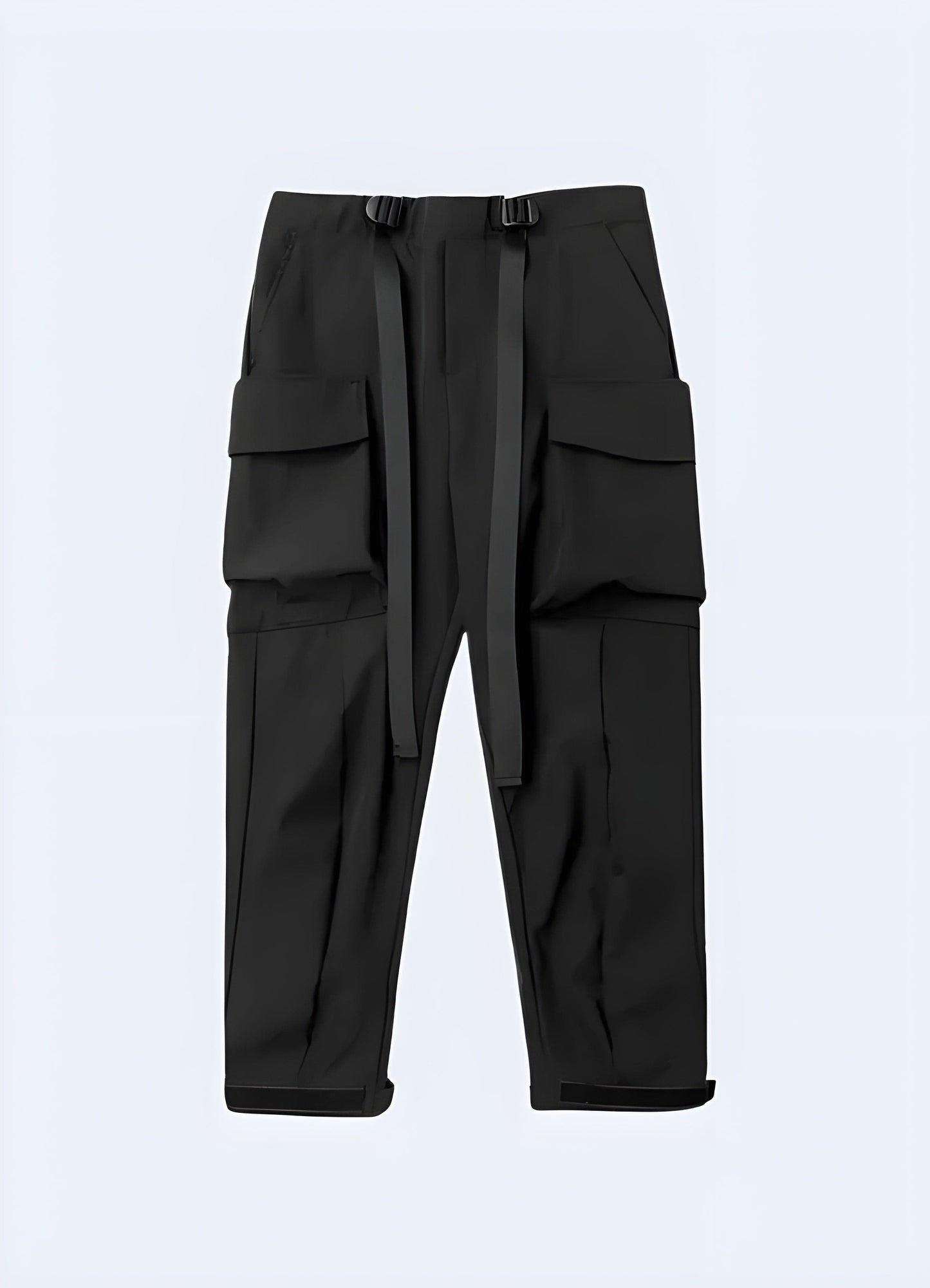 Male model showcasing the front view of black tactical pants, highlighting the sleek design and functional pockets, perfect for the UK fashion-conscious adventurer.