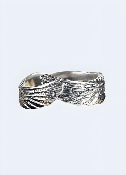 A beautiful angel feather ring from the UK, featuring intricate feather detailing that wraps around the finger, symbolizing grace and protection.