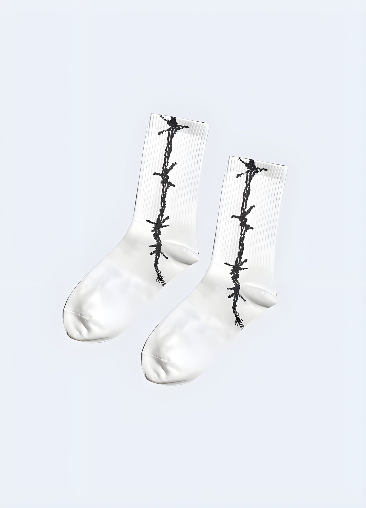 Trendy white socks featuring a striking barbed wire design, adding a bold accent to any outfit.