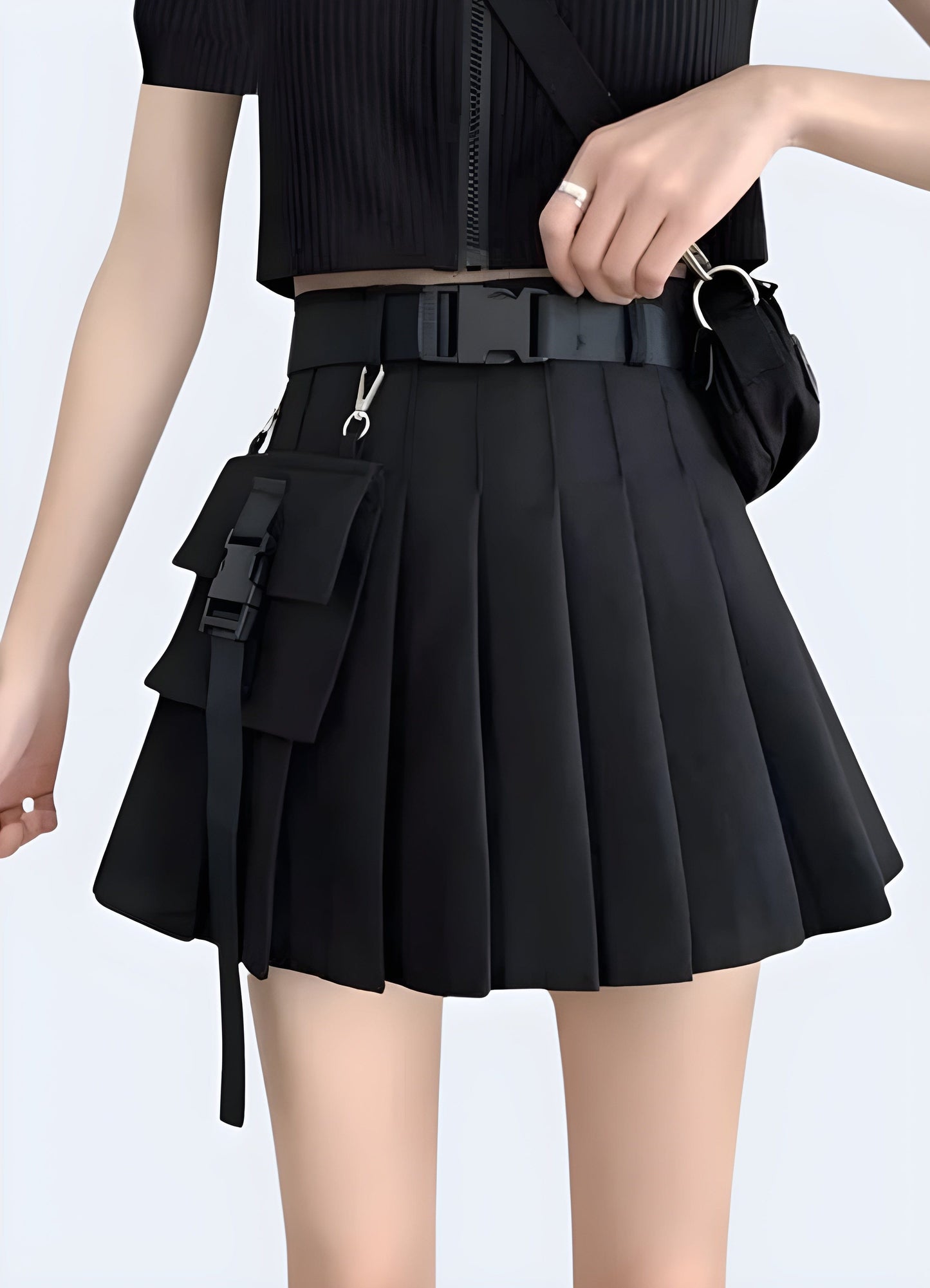 Edgy black cargo mini skirt, combining style and functionality for a trendy look in the UK urban fashion scene.