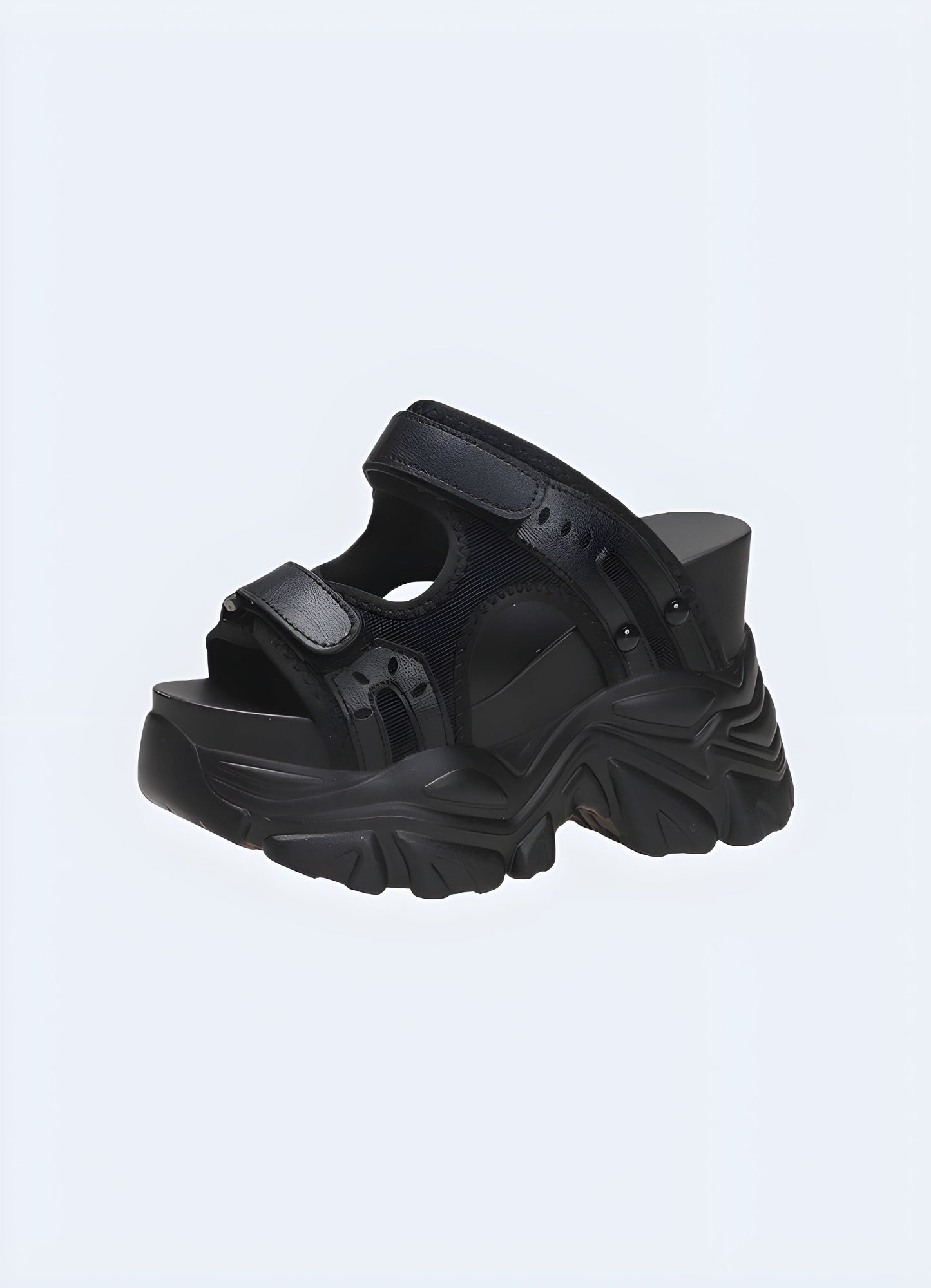 Black chunky sandals with a bold and modern design, perfect for adding an edgy touch to any summer outfit while providing comfort and support.