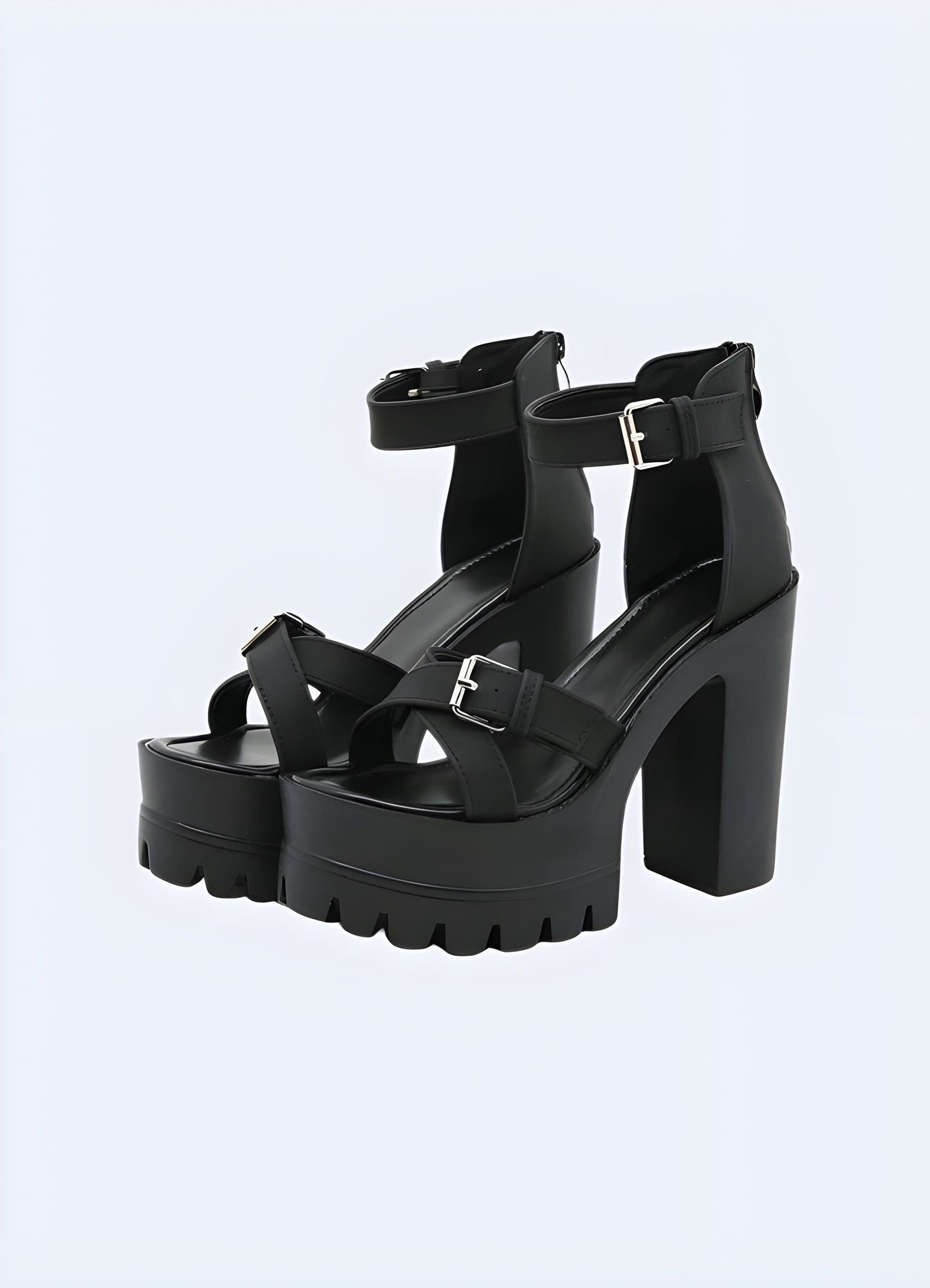 Front and side view of black chunky strap sandals, showcasing the eye-catching strappy silhouette, sturdy sole, and versatile style suitable for various outfits.