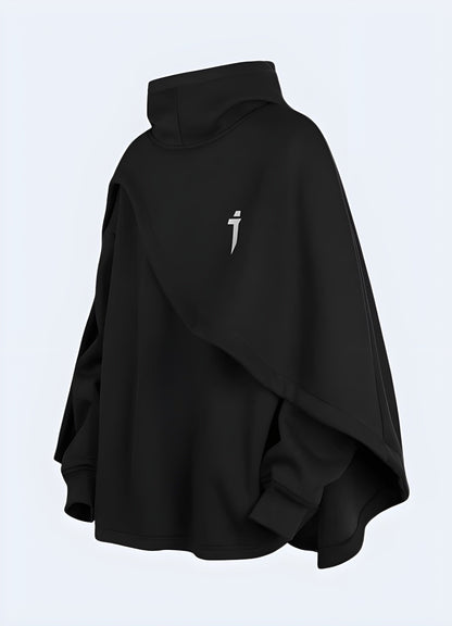 Model presenting the front side view of a black cloak hoodie, emphasizing its high-quality construction and attention-grabbing design for fashion-forward individuals in the UK.