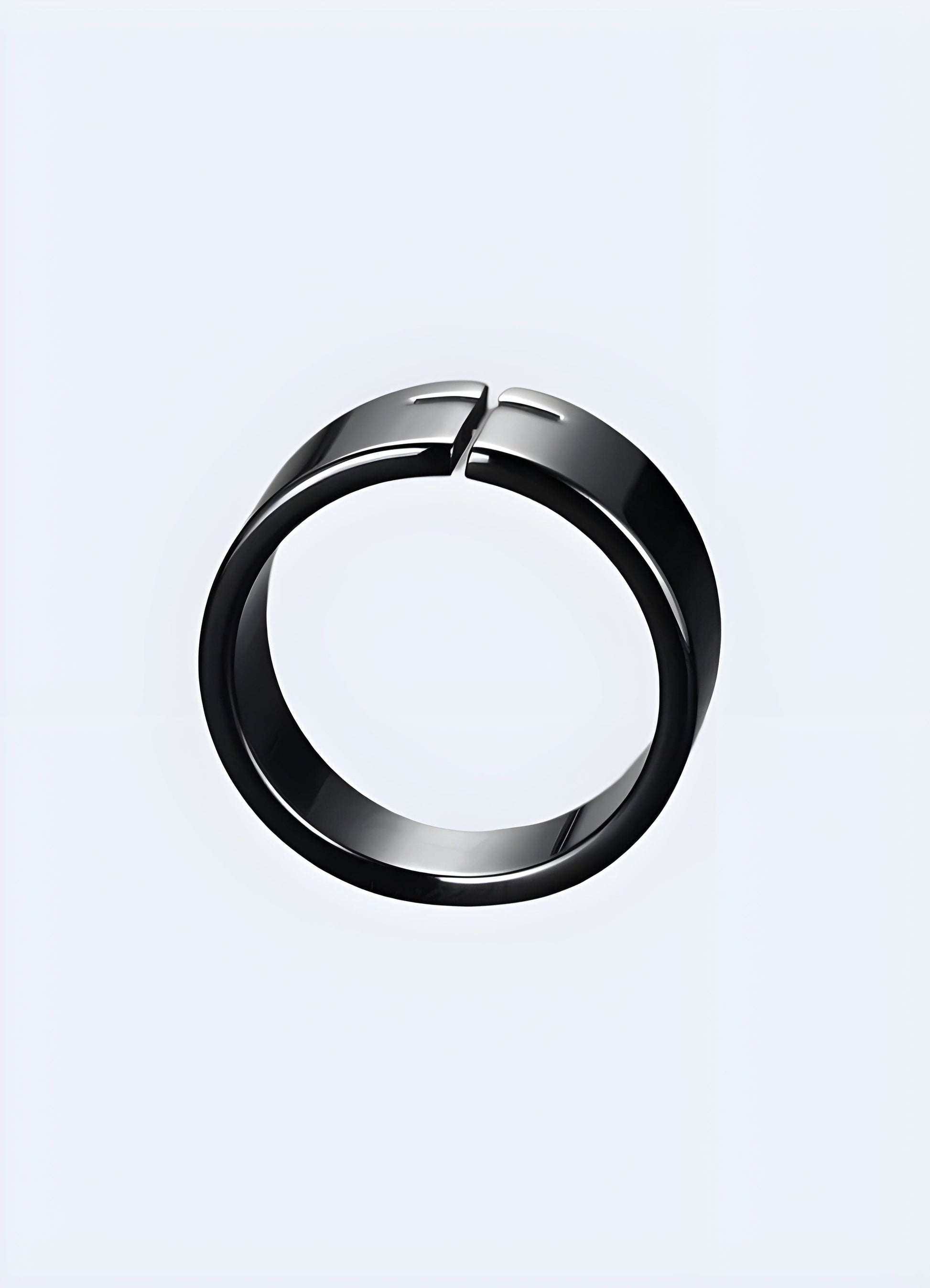 Side profile view of a black cross ring, highlighting its understated elegance and modern aesthetic, set against a soft-focused background.