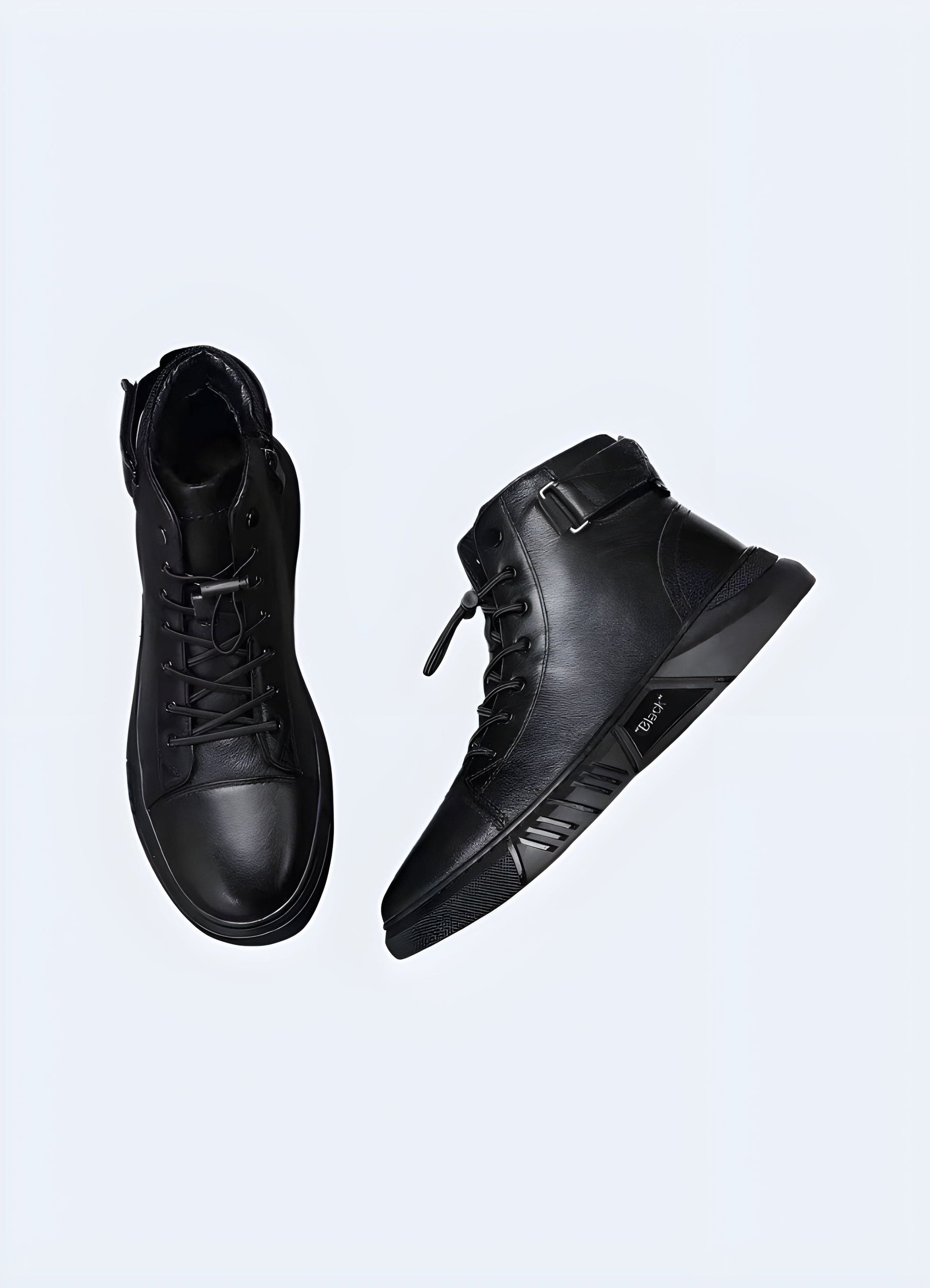 Front and side view of black leather high-top sneakers showcasing their classic yet modern design, ideal for fashion-forward individuals in the UK.