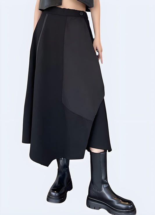 Black long techwear skirt combining a sleek, elongated silhouette with advanced technical fabrics, perfect for fashion enthusiasts seeking a modern and edgy look.