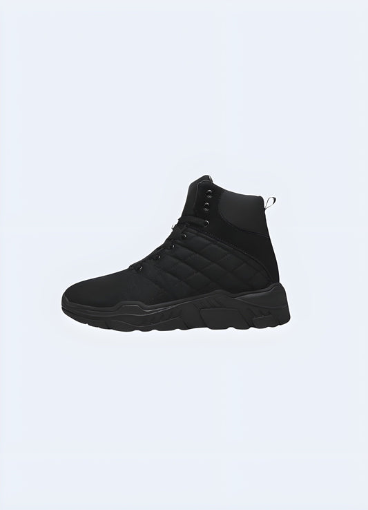 Sleek black techwear shoes with padded design, perfect for urban exploration and futuristic fashion enthusiasts in the UK.