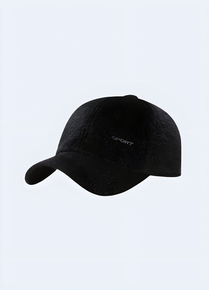 Black street fur cap for men, front view, UK. Stylish winter headwear for urban fashion.