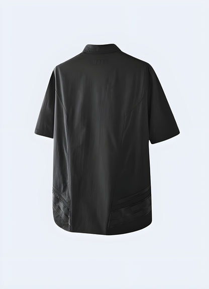 Back view of a black techwear shirt showcasing its minimalist design and functional features, perfect for fashion-forward individuals in the UK.