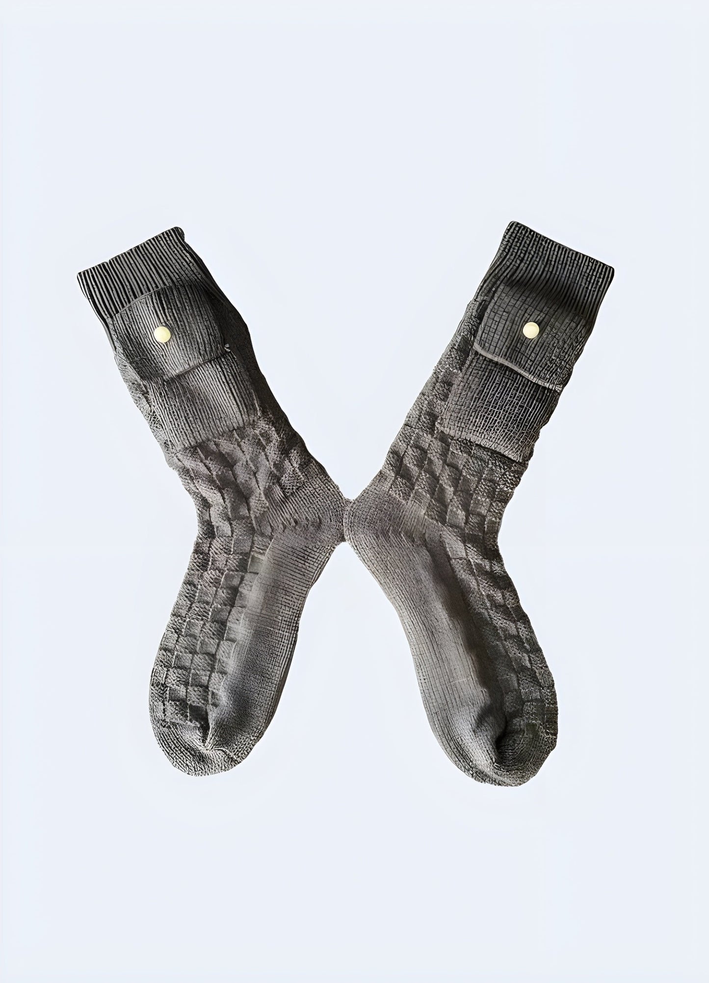 Grey cargo socks with front and side pockets, offering functionality and style for adventurers and commuters in the UK.