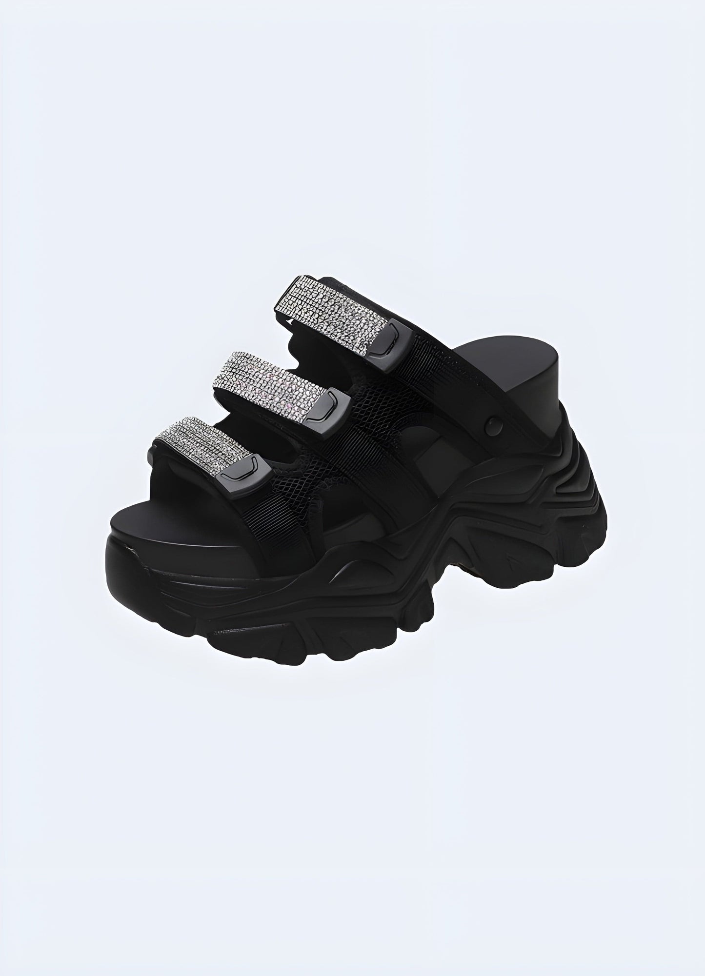 Chunky black sandals with a bold and trendy design, perfect for making a fashion statement while providing comfort and support for all-day wear.