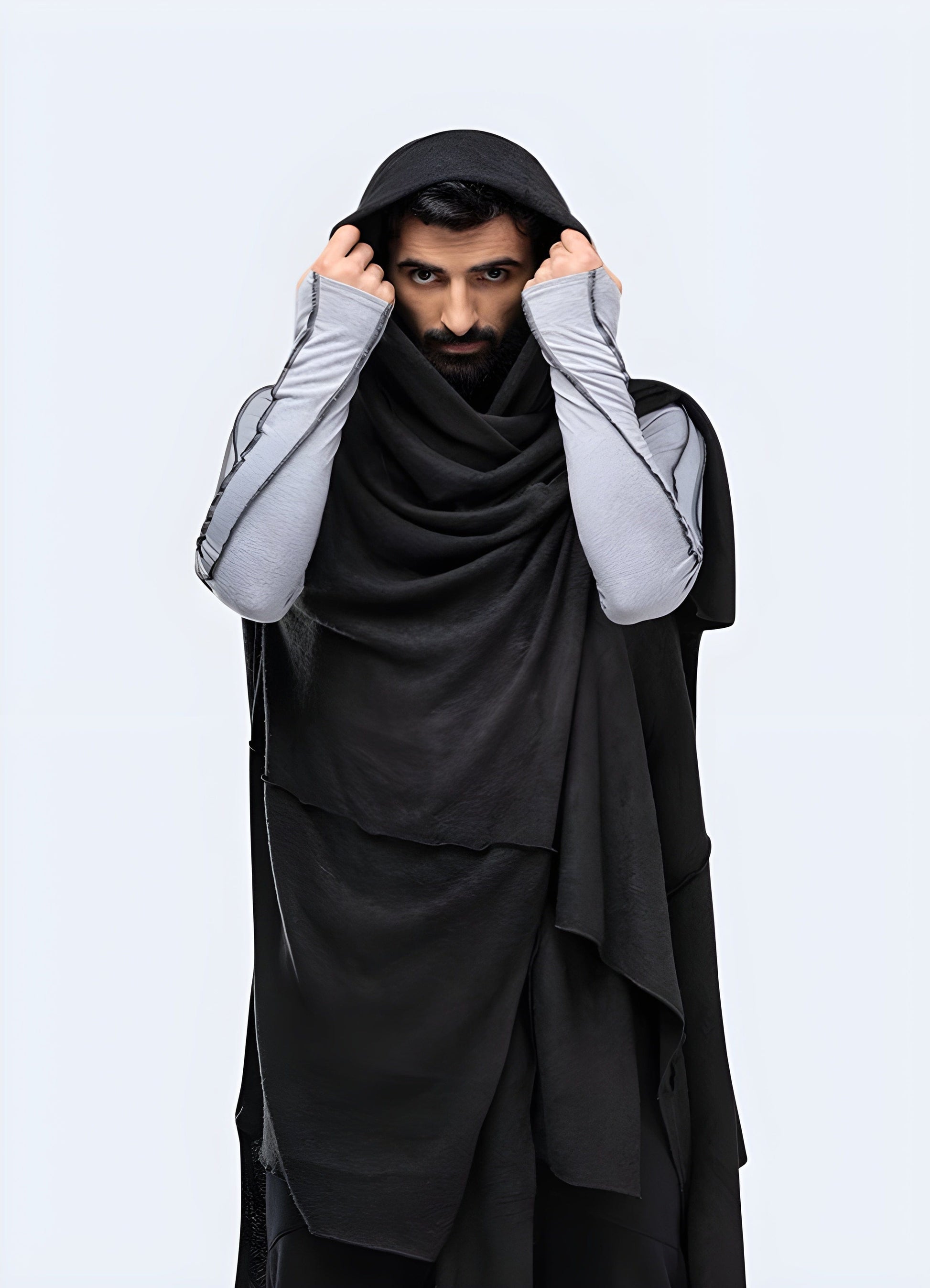 Edgy cyberpunk poncho for men, featuring a futuristic design and dystopian aesthetic, perfect for the UK alternative fashion scene.