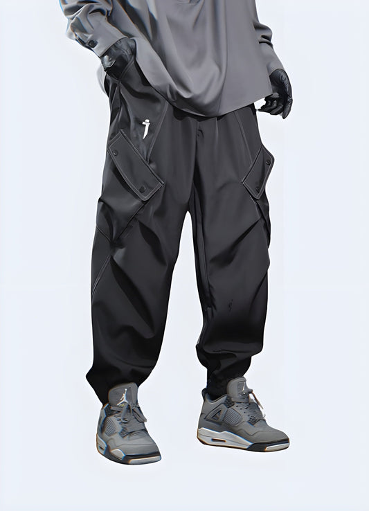 Dark grey cargo pants, front view, functional streetwear fashion in the UK.