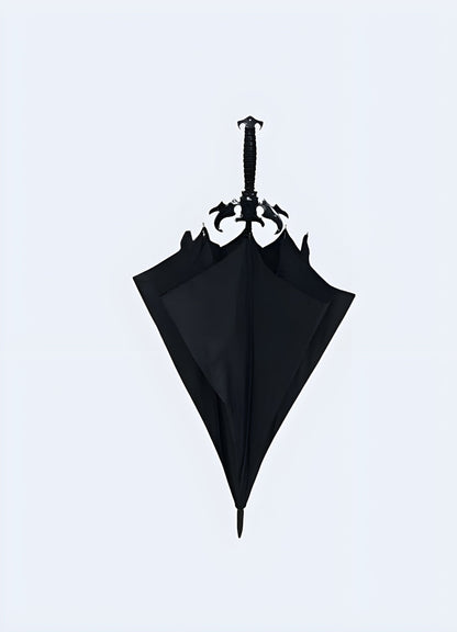 Front view of the Demon Slayer sword umbrella, highlighting its full-length appearance.The umbrella is designed to resemble a katana sword, with a handle. 