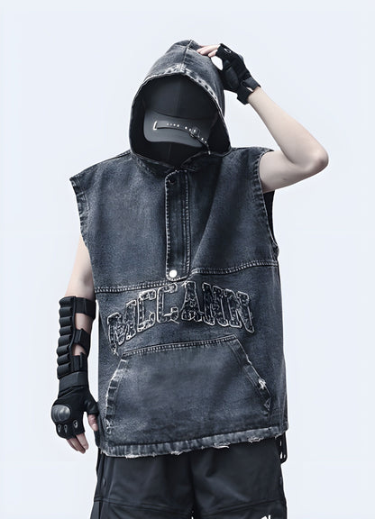  Trendy and versatile denim vest with an attached drawstring hood, featuring a relaxed fit, button-front closure, and convenient front pockets, perfect for layering over casual outfits for a stylish, street-ready look.