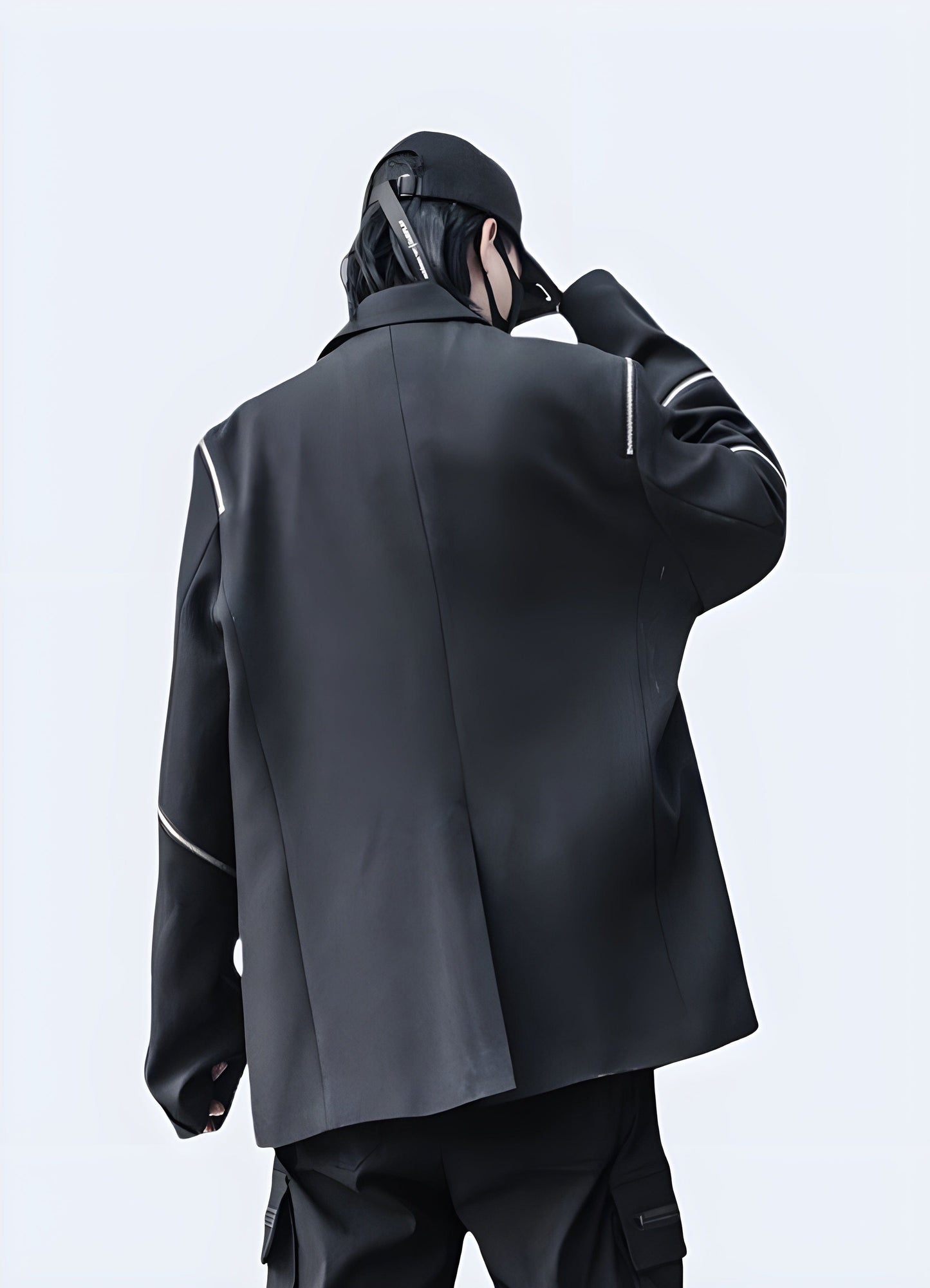 Back view of a futuristic techwear blazer, highlighting its innovative design and advanced materials, ideal for style-conscious individuals in the UK.