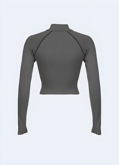 Back view of a grey techwear long sleeve shirt, showcasing its ergonomic fit and high-quality construction for comfort and durability in the UK urban landscape.