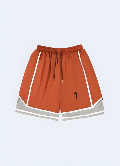 Eye-catching orange hip-hop techwear shorts, front view, designed for fashion-forward men in the UK.