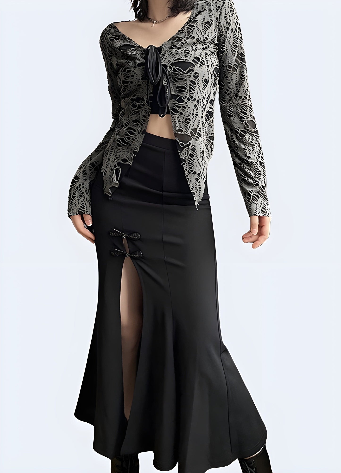 Dramatic long black gothic skirt, perfect for creating an edgy and mysterious look for alternative fashion enthusiasts in the UK.