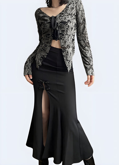 Dramatic long black gothic skirt, perfect for creating an edgy and mysterious look for alternative fashion enthusiasts in the UK.