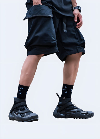 Back view of a man wearing black cargo shorts, highlighting the adjustable waistband and practical pockets, suitable for various activities in the UK.