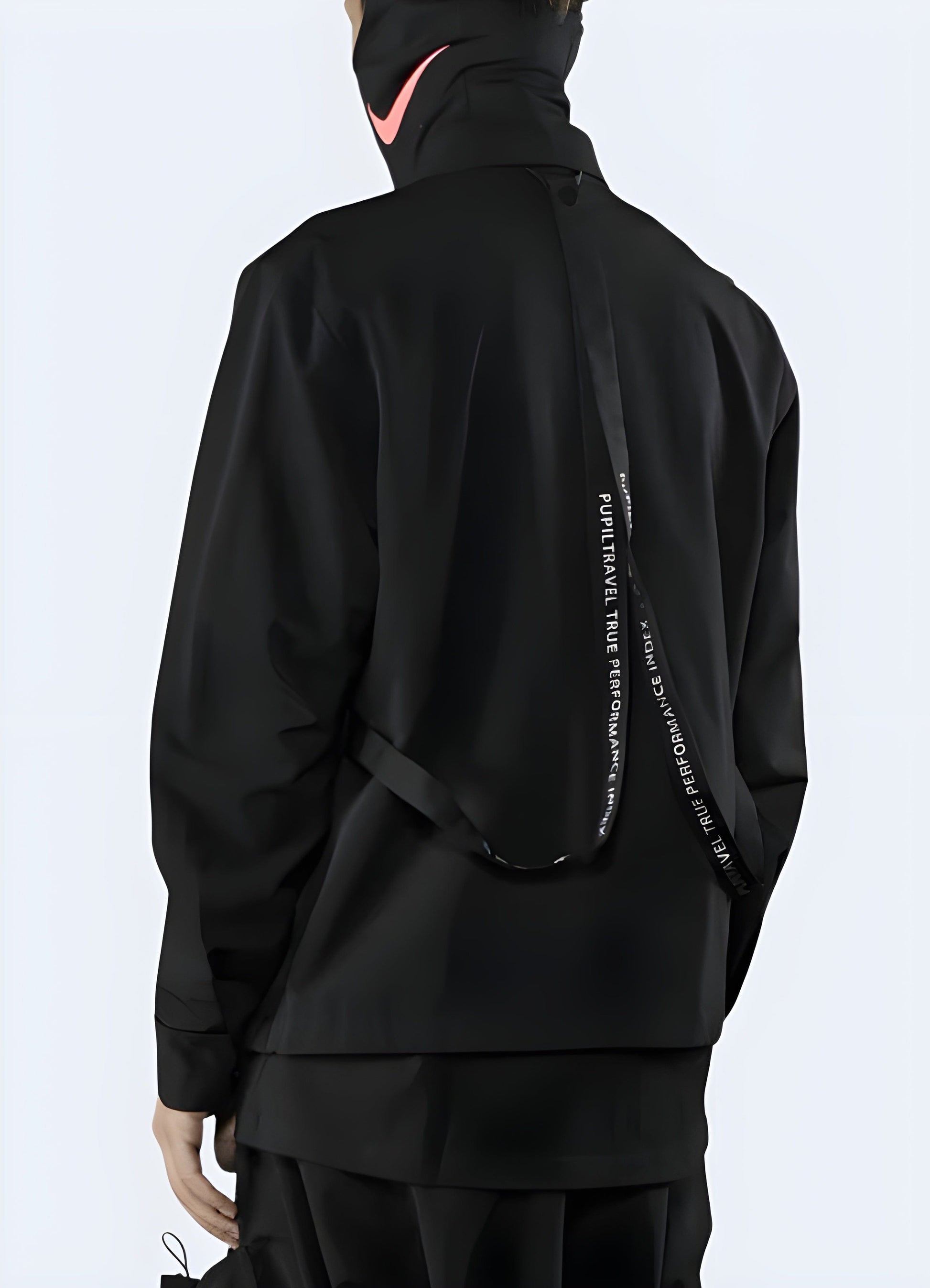 Back view of a man wearing a black kimono jacket, showcasing the unique silhouette and attention to detail, ideal for making a bold fashion statement in the UK.