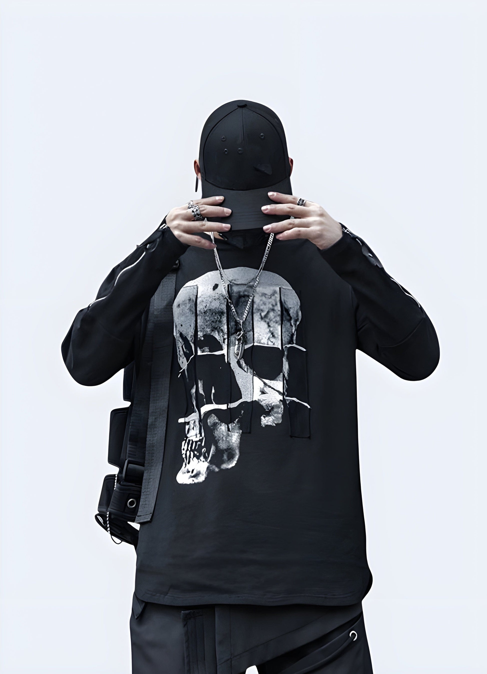 Front view of a man wearing a black skull shirt, showcasing its striking design and comfortable fit for alternative fashion enthusiasts in the UK.