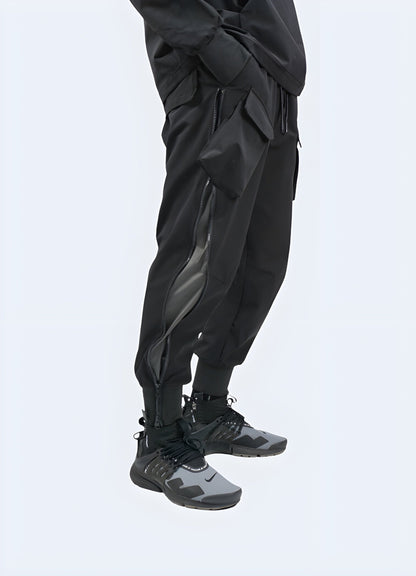 Side view of a man wearing innovative breathable tech pants, showcasing the garment's sleek design and functional features, perfect for athletes and fitness enthusiasts in the UK.