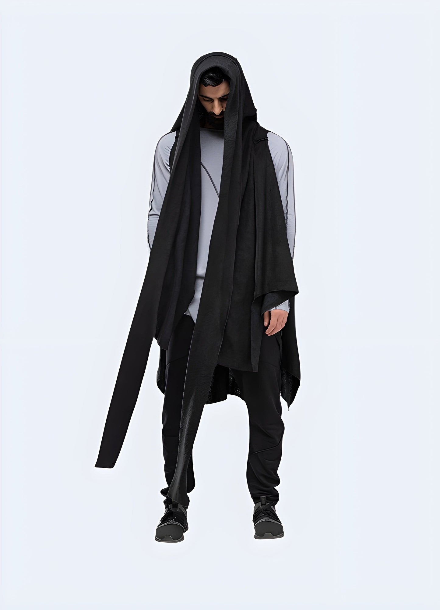 Male model wearing a cyberpunk poncho from the front view, highlighting the avant-garde style and high-tech materials, suitable for the UK fashion-forward individual.