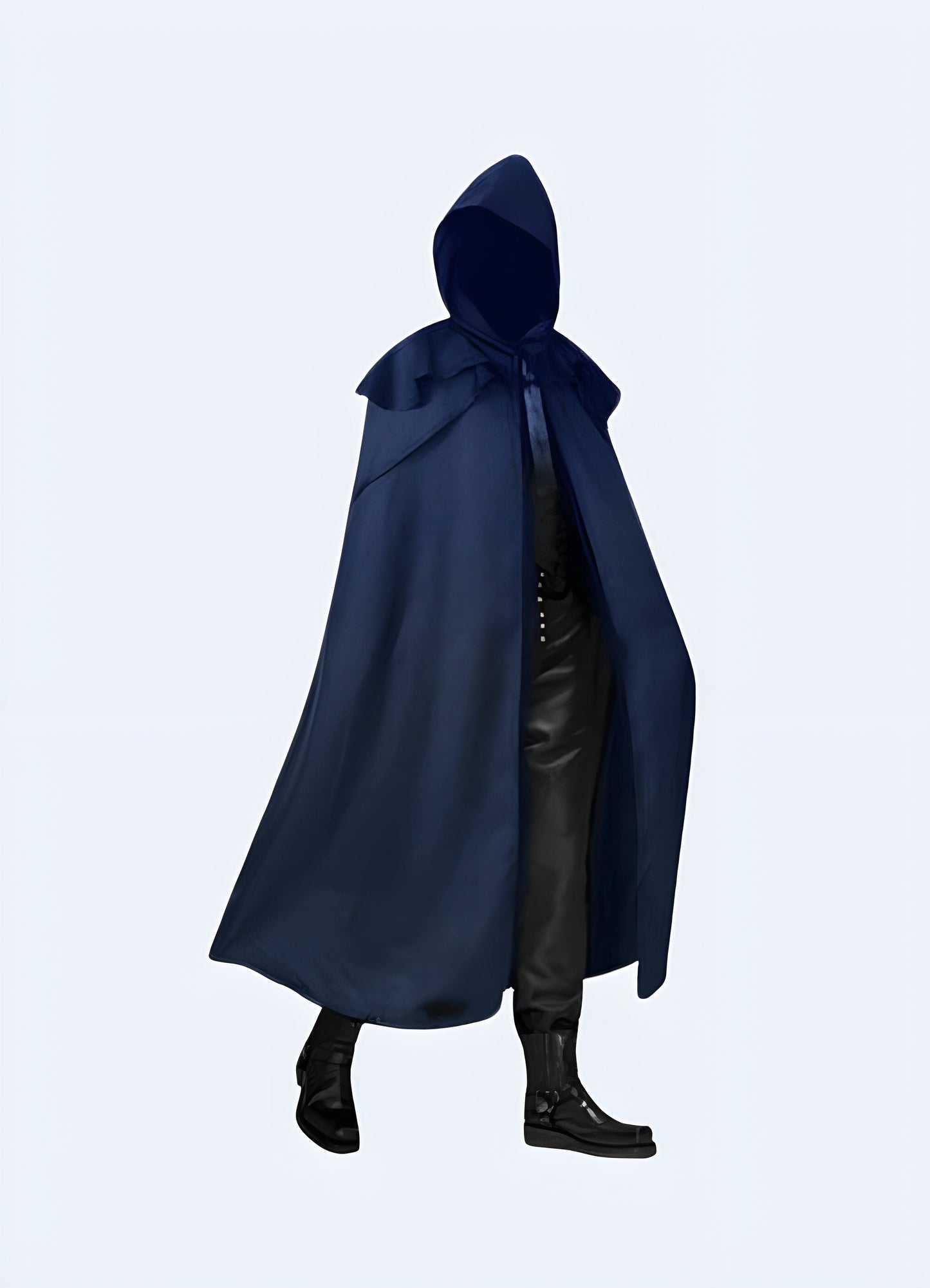 Front view of a man wearing a blue dark futuristic hooded cloak, showcasing its striking color and cutting-edge style for a bold fashion statement in the UK.