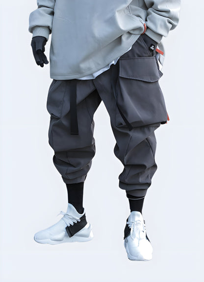 Front view of a man wearing gray tactical pants, featuring a comfortable fit and modern style, suitable for various occasions in the UK.