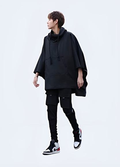 Stylish high collar poncho for man, featuring a modern and sophisticated design, perfect for the UK fashion-conscious individual.