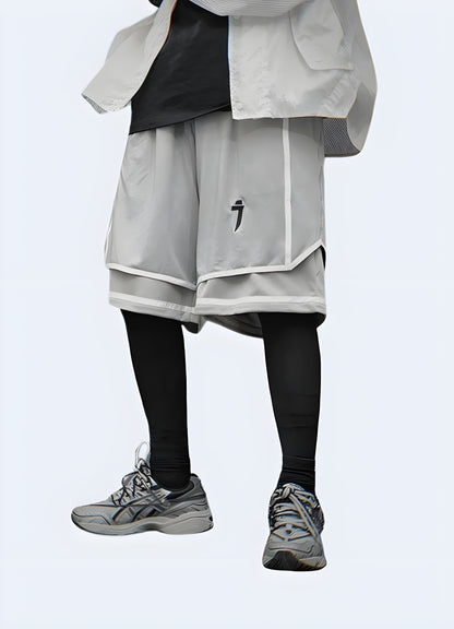 Man wearing hip-hop techwear shorts, front side view, demonstrating the versatility of these stylish shorts for UK streetwear enthusiasts.