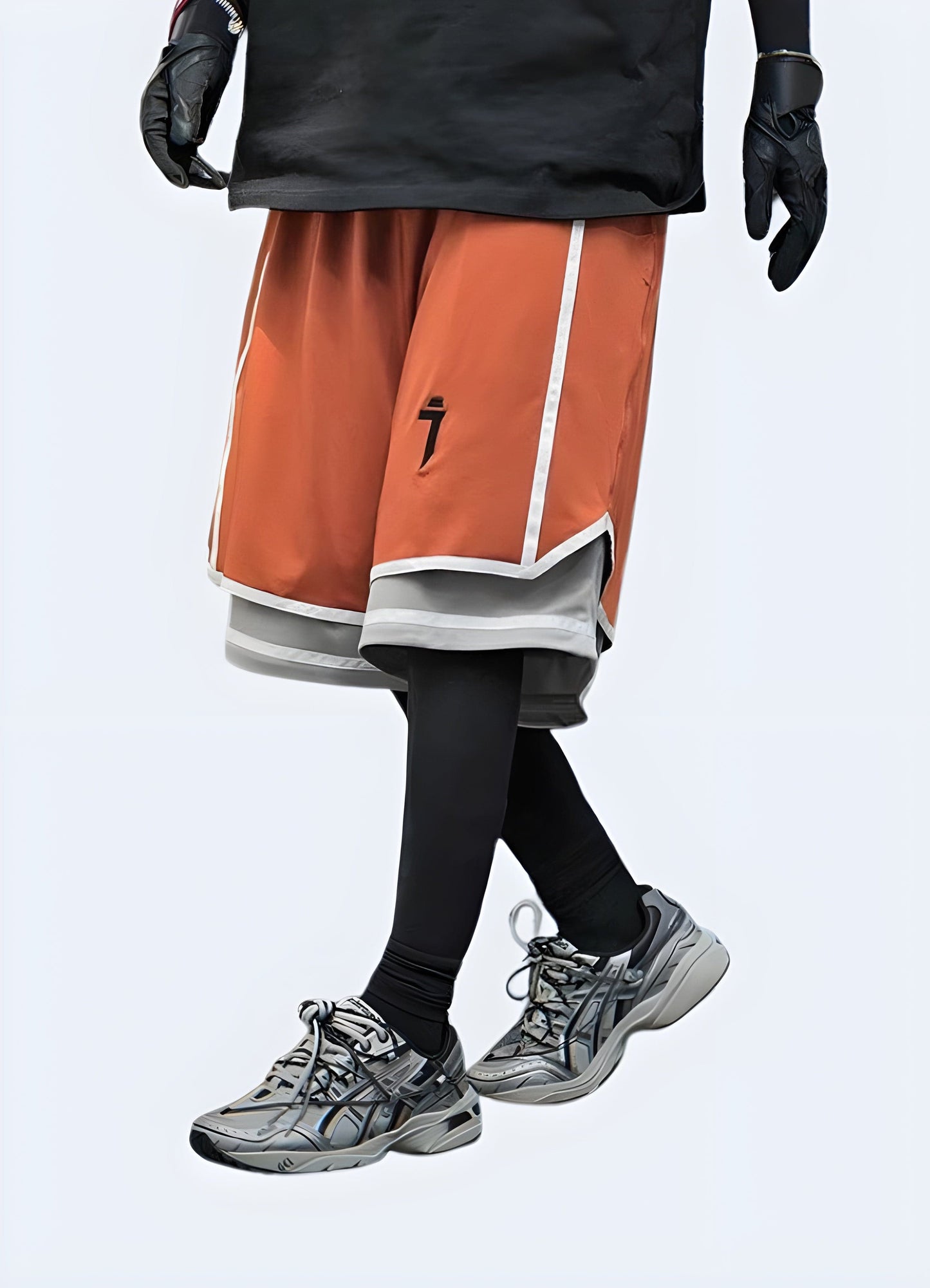 Man wearing hip-hop techwear shorts, side view, showcasing the sleek and modern design that complements UK urban fashion.