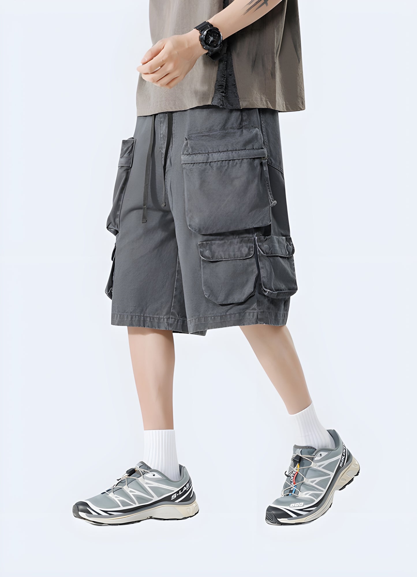 Front view of a man wearing industrial cargo shorts, showcasing the heavy-duty construction and practical features, perfect for the UK laborer.