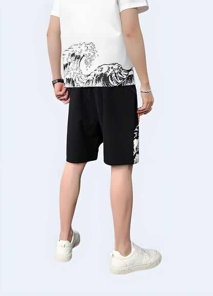 Back view of a man wearing Japanese wave shorts, highlighting the intricate wave pattern and high-quality construction, ideal for making a statement in the UK urban fashion scene.