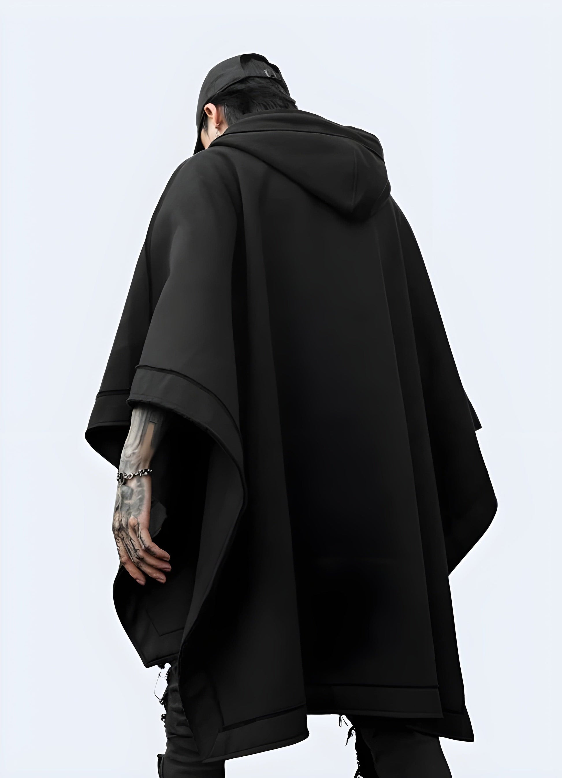 Back view of a man wearing a kimono hoodie, showcasing the unique hybrid design and comfortable fit, ideal for the UK fashion enthusiast looking for a standout everyday piece.