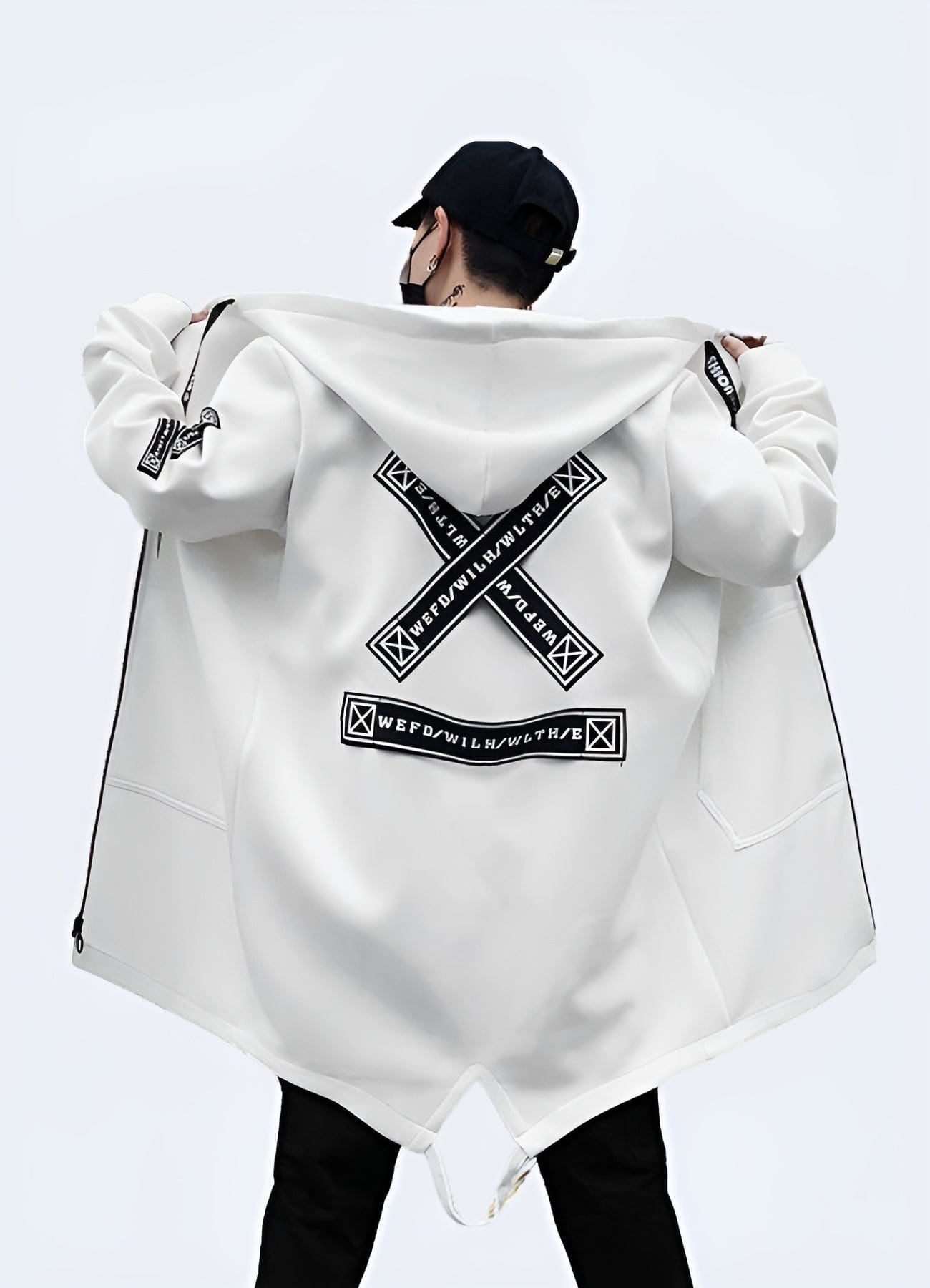 Back view of a model wearing a white streetwear coat, emphasizing its contemporary design, high-quality construction, and versatile style, perfect for fashion-savvy individuals in the UK's streetwear scene.