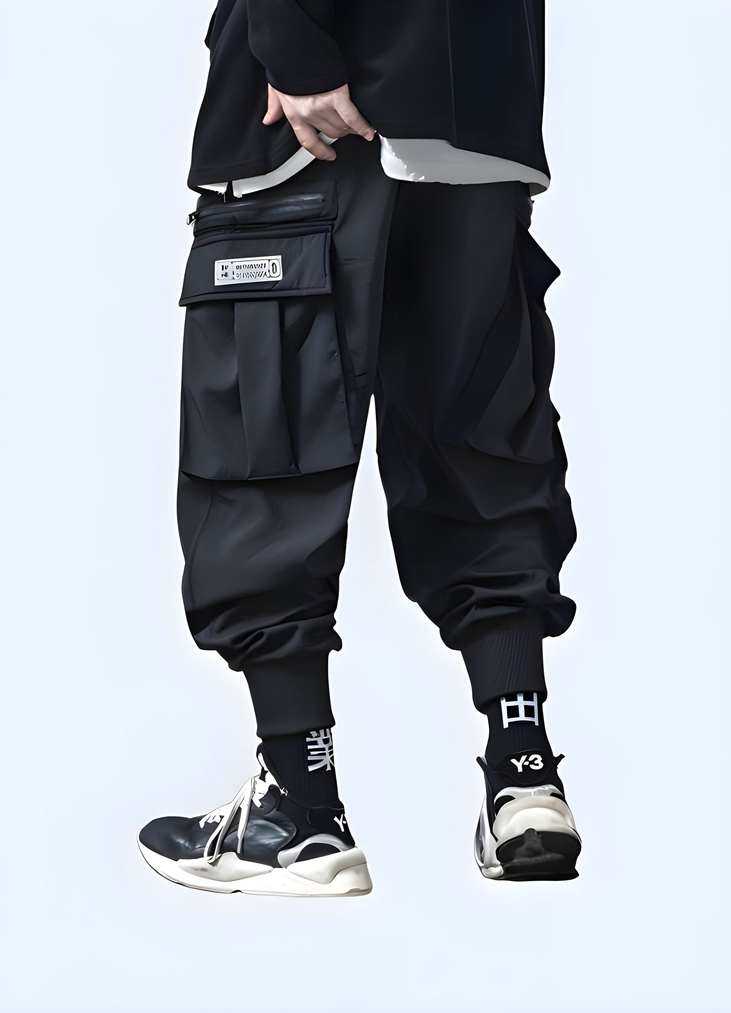 Back side view of a man modeling fashionable urban cargo pants, showcasing the garment's contemporary design and utility-inspired features, ideal for fashion-forward individuals in the UK.