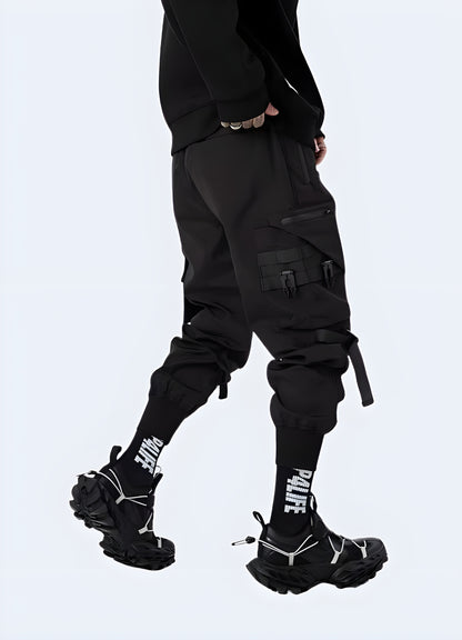 Right side view of a man modeling fashionable urban cargo pants, showcasing the garment's contemporary design and utility-inspired features, ideal for fashion-forward individuals in the UK.