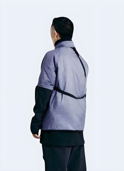 Man wearing a purple techwear jacket, showcasing the garment's unique back design and technical features, captured in the UK.