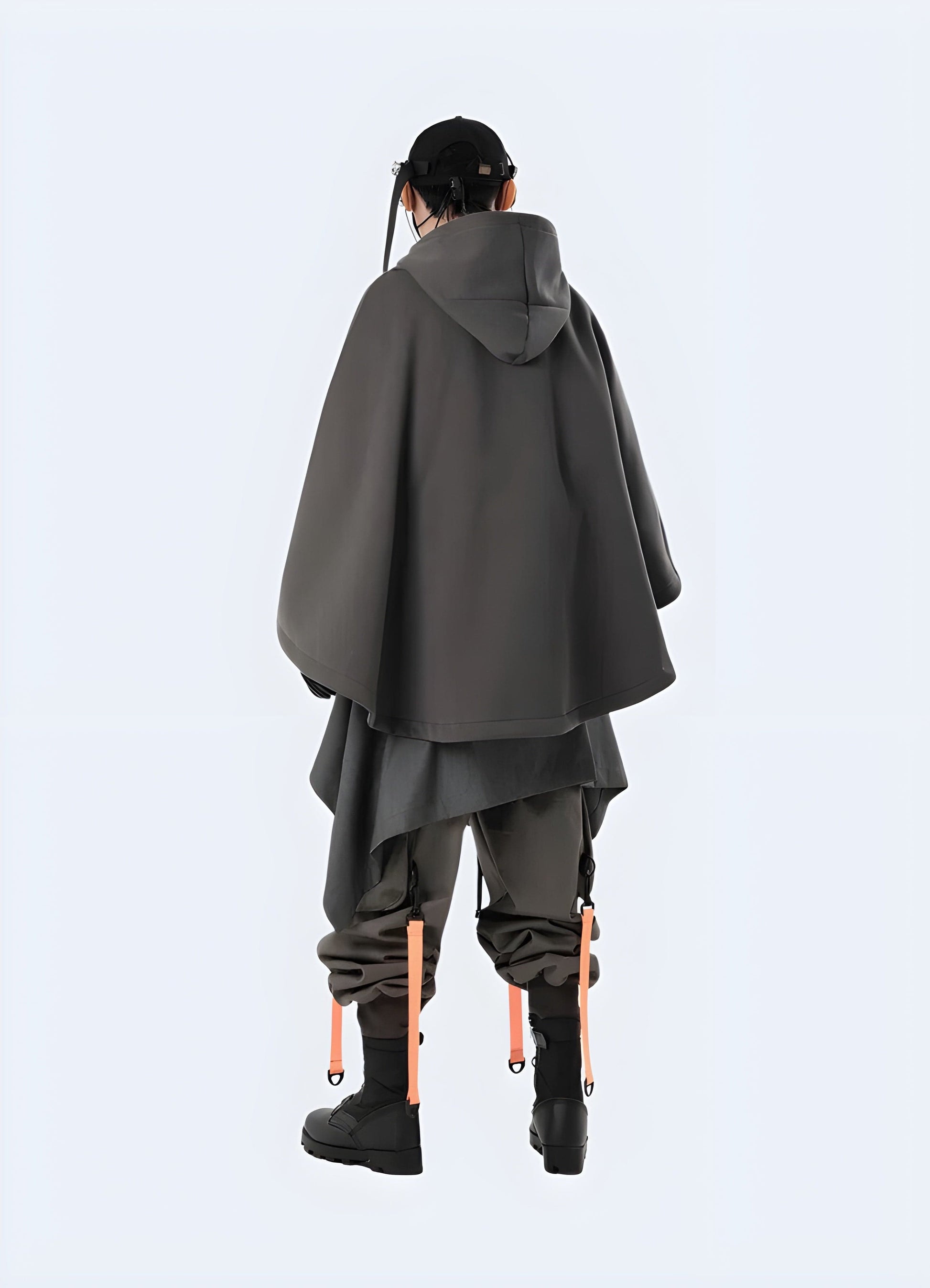 Back view of a man wearing a sci-fi poncho, showcasing the unconventional silhouette and attention to detail, ideal for making a bold statement in the UK.